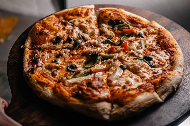 Truffle mushroom pizza with gourmet toppings and golden crust